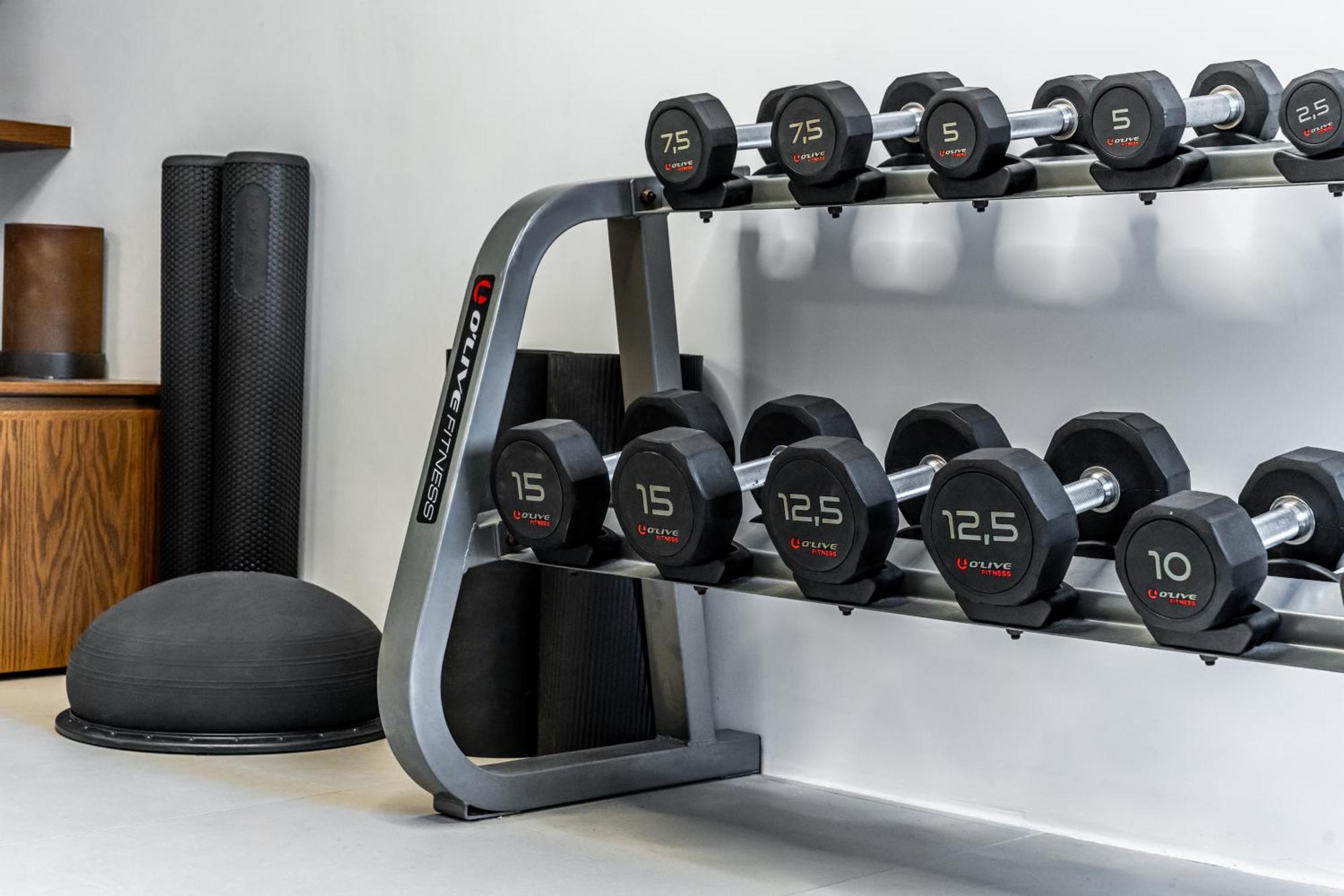 Orama Hotel & Spa Тира Экстерьер фото Dumbbells on a rack